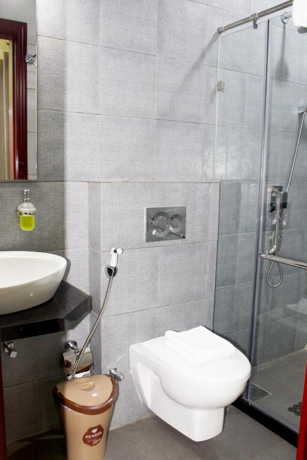 Ixoras Hotel Kinshasa Buitenkant foto