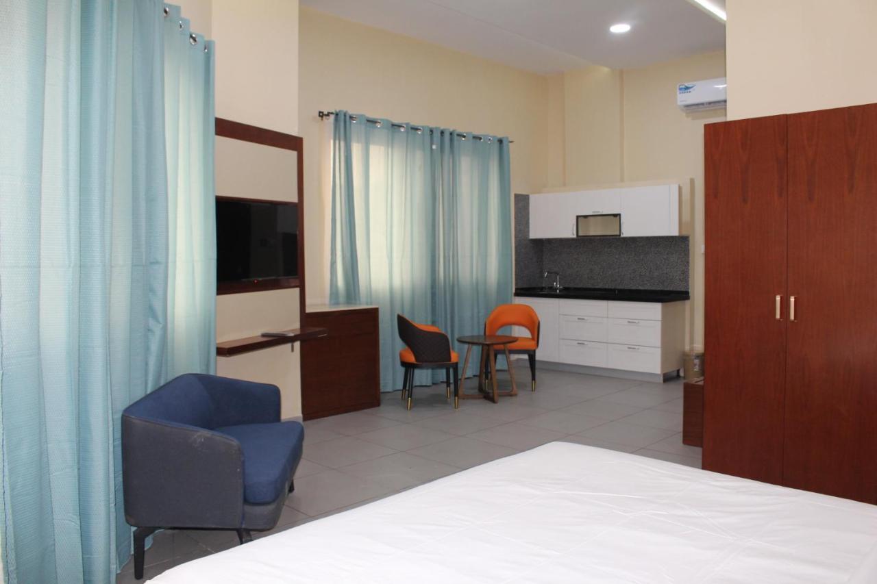 Ixoras Hotel Kinshasa Buitenkant foto
